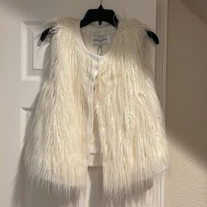 Cupcakes and cashmere winter white faux fur vest